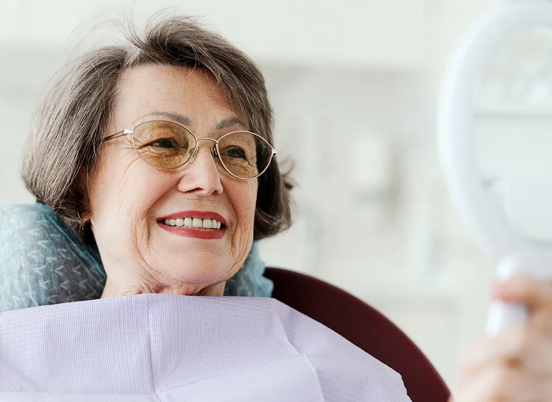 Should You Save Your Tooth With a Root Canal or Replace It With an Implant?