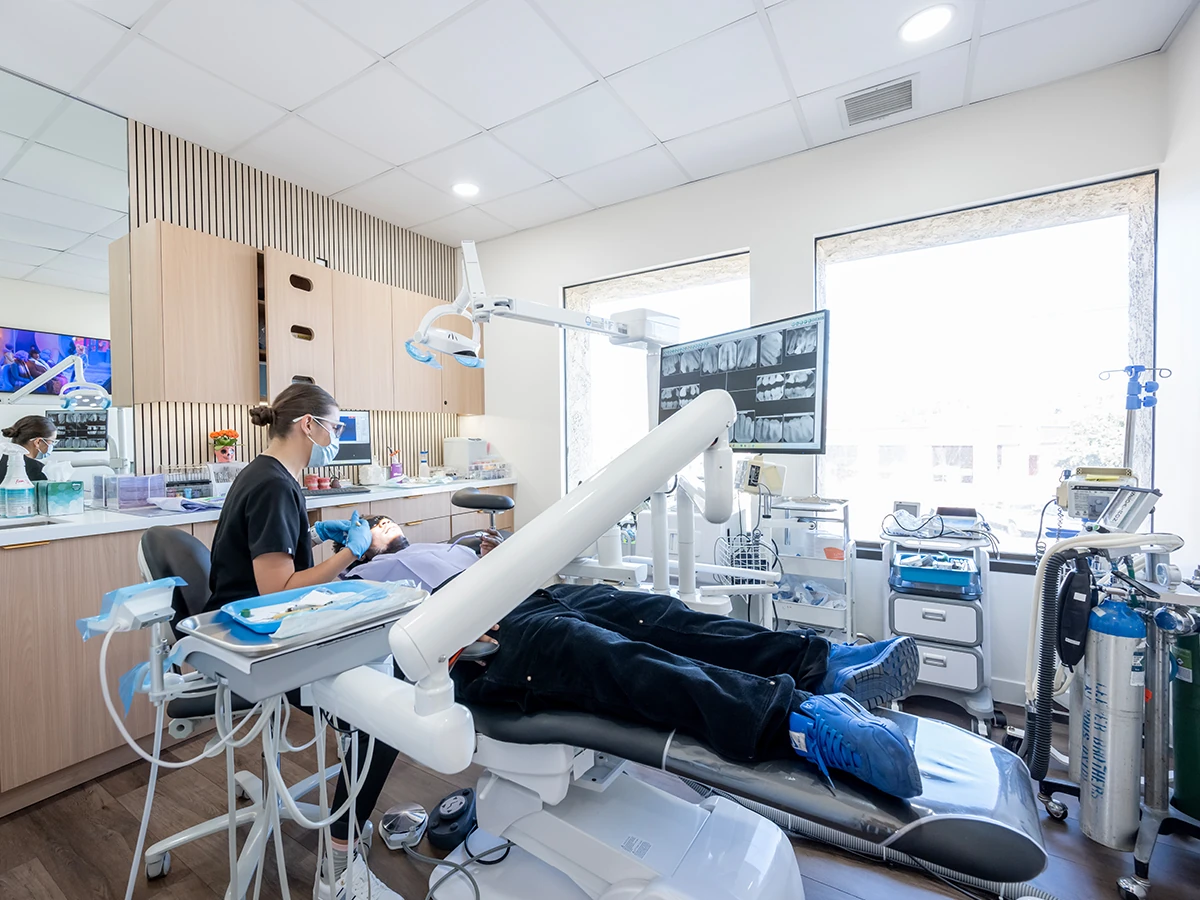 A patient receiving a professional teeth cleaning